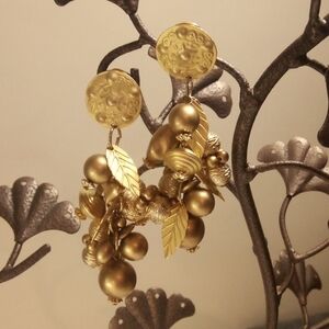 Gold tone 3 1/2" long Cha Cha earrings